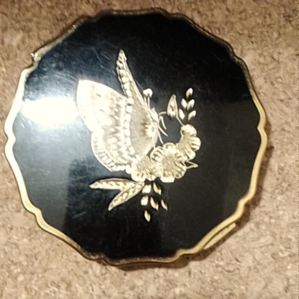 Vintage Stratton compact. Gold tone and enamel black with butterfly and flowers